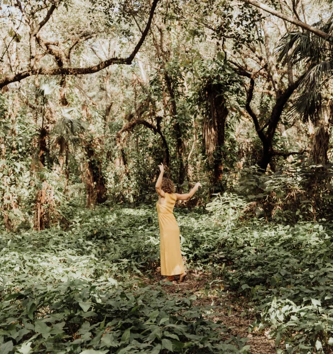 Alison dancing among the trees