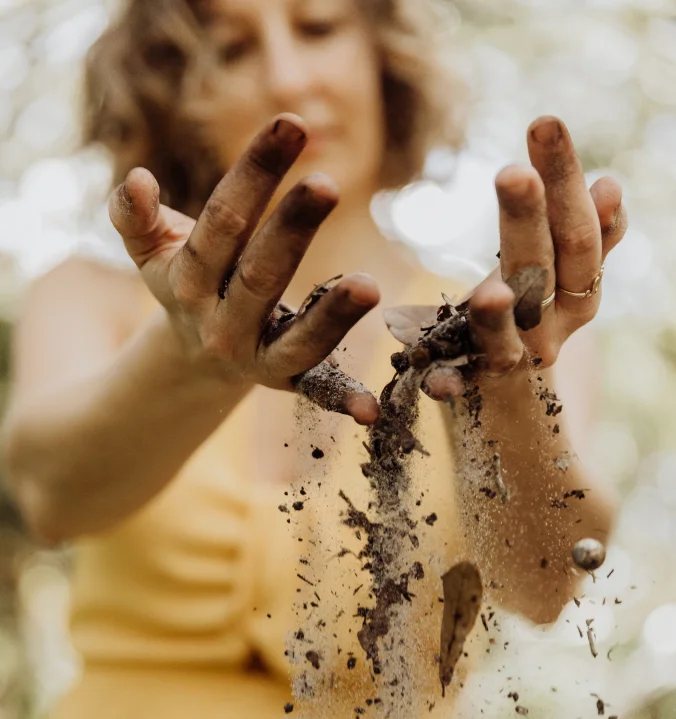 Alison with dirty in her hands
